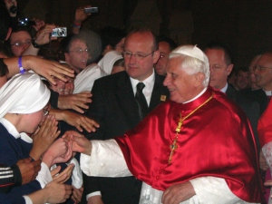 Pope Benedict XVI greets the Sisters of Life as they reach out to touch him at the Mass and Dedication of the Altar held in St. Mary's Cathedral Saturday (Catholic Herald photo by Ben Emmel)